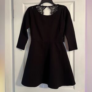 Brand new Lulu’s black open-back dress. Size M